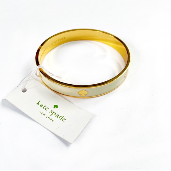 Kate Spade gold with white enamel logo bangle